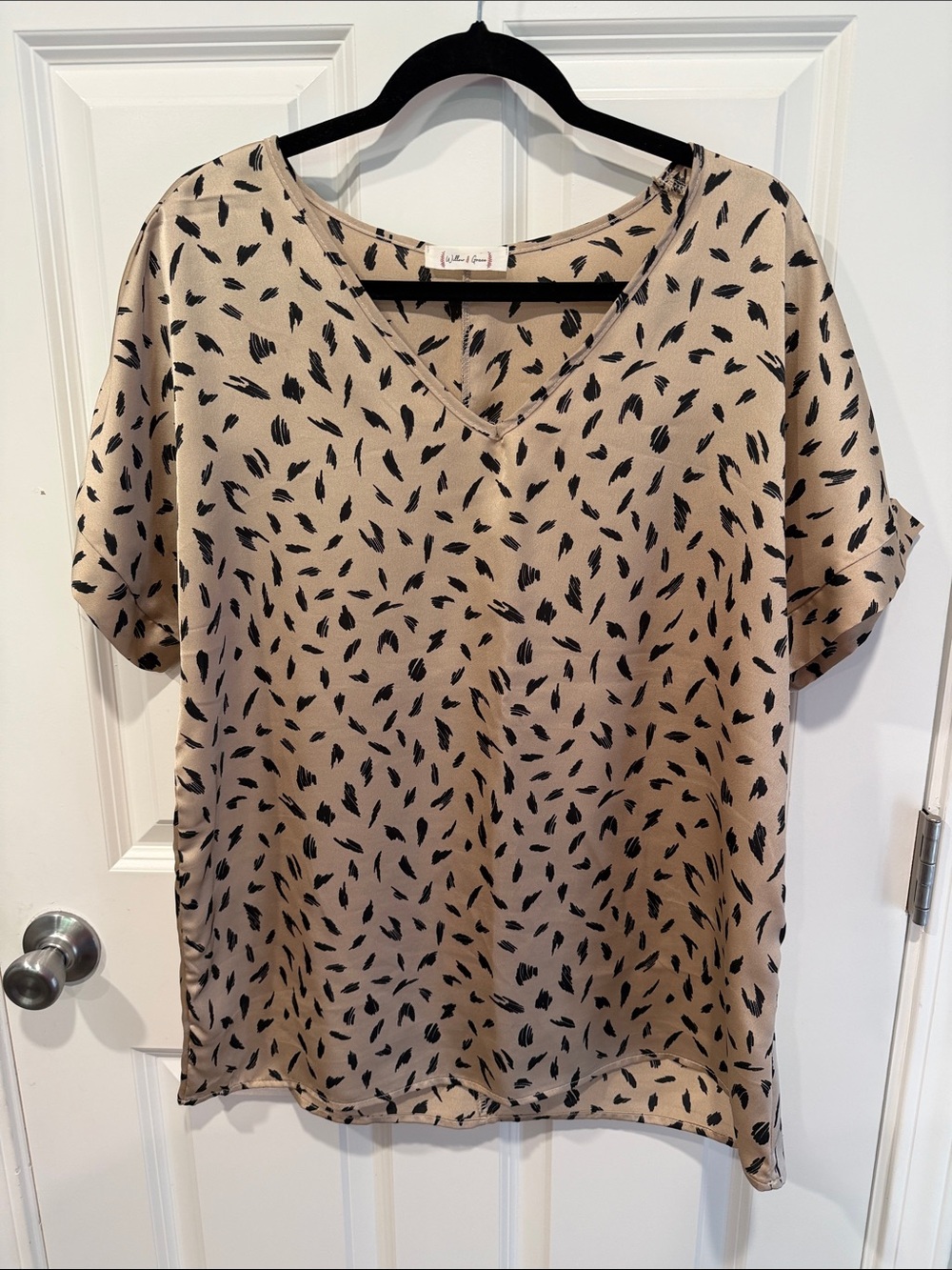 Beige Short Sleeve V-Neck Top with Black Abstract Feather Print